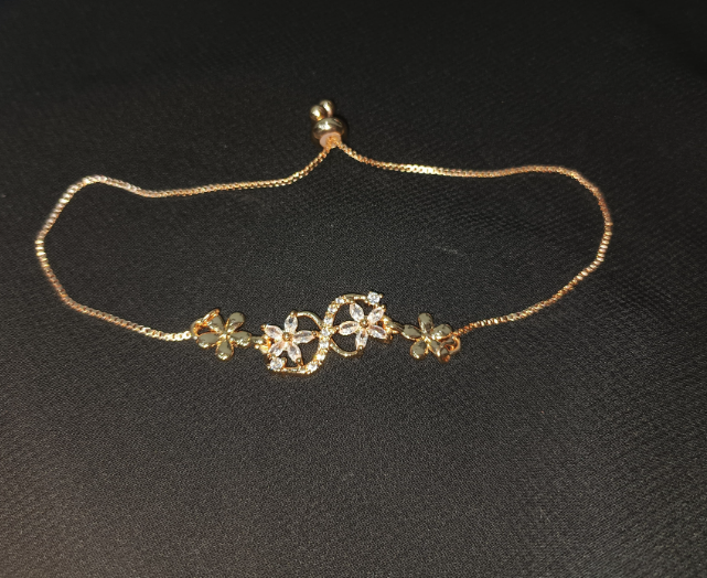 Blossom Curve Bracelet – Crystal-studded floral bracelet with adjustable chain