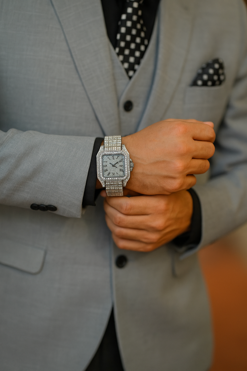 Regent Frost watch worn with grey suit – iced out silver luxury men’s watch with rhinestones and Roman numerals