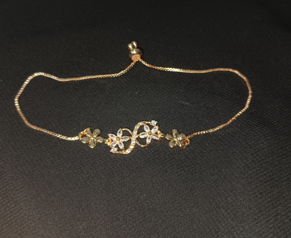 Blossom Curve Bracelet – Crystal-studded floral bracelet with adjustable chain