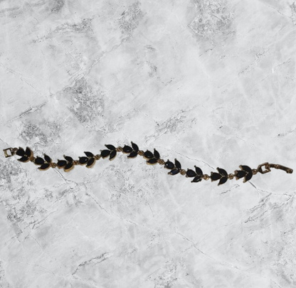Midnight Ivy Bracelet – Black enamel leaf chain in gold finish