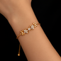 Blossom Curve Bracelet – Crystal-studded floral bracelet with adjustable chain