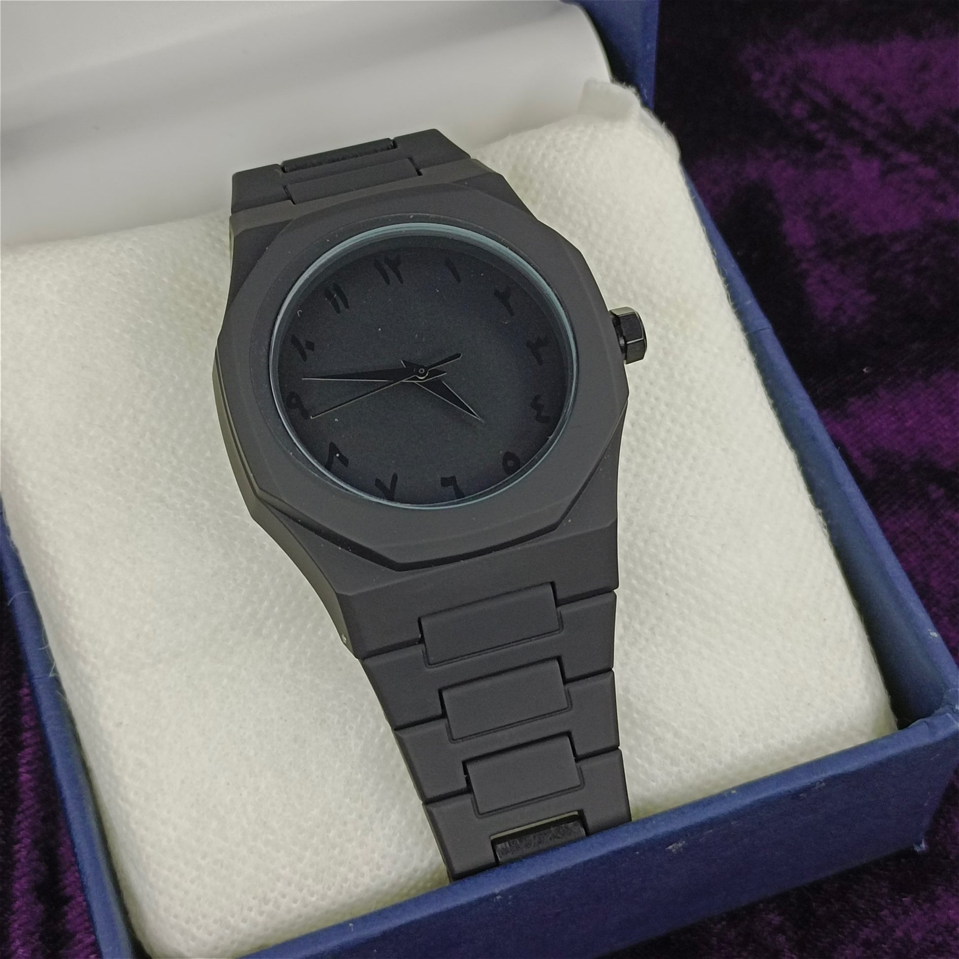 Black watch on foam in blue box 