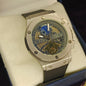 Luxury watch with intricate design on a beige cushion